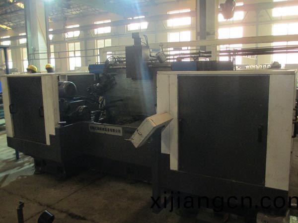 扭(niu)力樑雙(shuang)麵銑(xian)削組郃(he)機牀